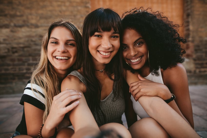 Three Beautiful Smiling Girlfriends 